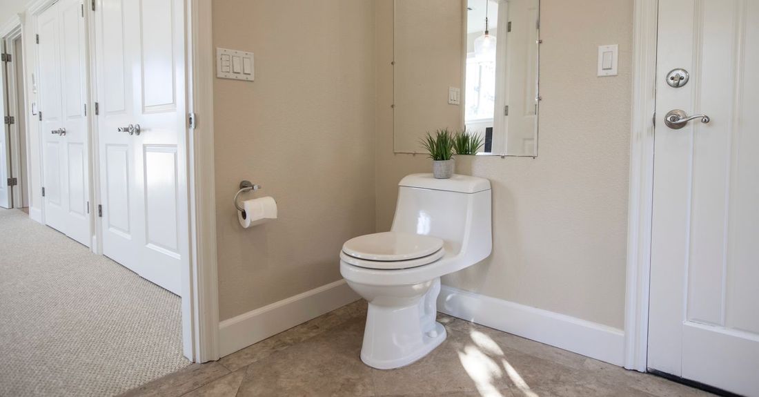 Clean modern bathroom with a white toilet